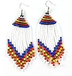 These African bead earrings are handmade by our Massai artisans in Kenya, East Africa. The beads are put on a string one by one and rolled around a wire. The entire process is done by hand. Authentic and Unique. Fair Trade Product. 100% handmade with love. Handmade in Kenya, East Africa Ethically & sustainably handcrafted Measures Approximately 2" in diameter Artisans make 2-3 times what they would earn in their local market. Each pair of earrings is made by hand so there may be slight and s Bohemian Adjustable Beaded Earrings With Large Beads, Artisan Beaded Earrings For Festivals, Adjustable Artisan Beads With Dangling Details, Traditional Adjustable Beaded Earrings, Adjustable Dangling Beads Earrings For Festivals, Adjustable Artisan Dangle Beads, Artisan Colorful Dangle Beads, Festival Teardrop Jewelry With Large Beads, Teardrop Beach Jewelry With Colorful Beads