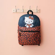 This backpack is the perfect combination of fashion and fandom! From going to school to tagging along on a mini family road trip, you will love carrying your essentials in this fun Sanrio Hello Kitty backpack! This kid's backpack is designed with ample room for stowing your lunch, books, craft supplies, and other essentials. Ideal for school, travel, outdoors, summer camps, or just having fun! Officially licensed. Cat Design Backpack For Back To School, Hello Kitty Print School Backpack, Back To School Bag With Cat Design, Back To School Bags With Cat Design, Hello Kitty Print Bags For Back To School, Playful Hello Kitty Print Backpack For Travel, Playful Hello Kitty Backpack For Back To School, Back To School Backpack With Cat Design, Playful Hello Kitty School Backpack