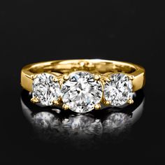 Ross-Simons - 2.00ct t. w. Lab Grown Diamond Three-Stone Ring Round Cut in 14kt Yellow Gold. Size 7. Impeccable sparkle times three! Our exceptional three-stone ring flashes 2.00 ct. t. w. round brilliant-cut lab-grown diamonds in a high-polished 14kt yellow gold setting. Lab-grown diamonds are identical to mined diamonds according to their optical, physical and chemical properties. All Ross-Simons lab-grown diamond jewelry includes an IGI Laboratory-Grown Diamond Report to verify cut, color, cl Yellow Gold Three Stone Cluster Ring, Yellow Gold Cluster Ring With Three Stones, Gold Three Stone Cluster Ring, Classic Gold Three Stone Cluster Ring, Gold Cluster Ring With Three Stones, Formal Yellow Gold Three Stone Cluster Ring, Physical And Chemical Properties, Fall Entertaining, Pure Design