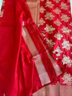 **SILK MARK CERTIFIED** **Gorgeous pure Banarasi Katan Silk Saree with blouse piece (unstitched) in red and gold** **100% silk and high quality** **Direct from Banaras** Material: 100% Katan Silk Blouse piece: Included (Unstitched) Fall and Pico: YES Color: Green, Gold Occasion: Festivals, Weddings, Cultural Events, Puja, Parties, Formal Gatherings, Family Functions, Graduations Experience the charm of this Handwoven Green Banarasi Meenakari Katan Silk Saree, a beautiful blend of art and traditi Red Cotton Silk Kurta For Wedding, Wedding Red Cotton Silk Kurta, Red Slub Silk Sets For Festivals, Traditional Red Slub Silk Sets, Red Cotton Silk Dupatta With Zari Work, Wedding Cotton Silk Red Dupatta, Red Cotton Silk Dupatta For Wedding, Red Cotton Silk Sets With Dupatta, Wedding Red Cotton Silk Dupatta