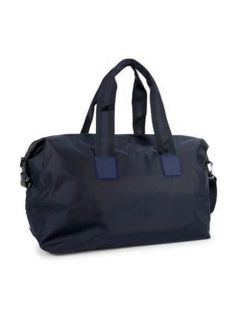 Sturdy and durable, this cool duffel bag comes with logo detailing, handy inside pockets and plenty of room for all your essentials..Top zip closure.Black hardware.Two inside slip pockets.Lining: Recycled polyester.Trim: Polyamide & textile.Recycled polyester.Imported.SIZE.Double top handles, 10' drop.Adjustable, removable crossbody strap, 10'-28' drop.24'W x 14'H x 9'D.Please note: Dust bag not included..Sturdy and durable, this cool duffel bag comes with logo detailing, handy inside pockets an Travel Collection, Black Hardware, Personal Shopping, Duffel Bag, Crossbody Strap, Travel Luggage, Luggage Bags, Inside Pocket, Dust Bag