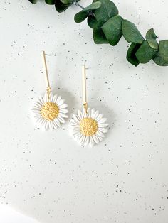 These white daisy earrings add the perfect floral statement to your spring outfits! Floral details are sculpted individually by hand in small batches. Shop the rest of the floral collection here: https://www.etsy.com/shop/PaintedLeafStudioCo?section_id=47823729 Earrings measure approximately 2 inches in length and 1 inch in width and are lightweight. Hand sculpted polymer clay earrings, crafted delicately and finished with attention to detail. Hypoallergenic nickel-free posts, hoops, hooks, and Spring 3d Flowers Dangle Earrings, Spring White Jewelry With Matching Earrings, White Jewelry With Matching Earrings For Spring, White Dangle Flower Earrings For Spring, Handmade Flower Dangle Earrings For Spring, Spring Handmade Flower Dangle Earrings, White Flower Earrings With Flower Decoration For Summer, White Dangle Earrings For Spring, White Flower Earrings With Summer Decoration