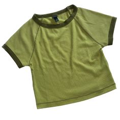 Brand: Wild Fable Size: Xs Color: Green New With Tags Length: 16” Approximately Pit To Pit: 13” Approximately Casual Ribbed Cropped Cotton T-shirt, Green Stretch Cotton Cropped T-shirt, Basic Ribbed Cropped T-shirt For Summer, Green Ribbed Crew Neck T-shirt, Casual Ribbed T-shirt For Spring, Green Y2k Stretch T-shirt, Trendy Green Ribbed T-shirt, Y2k Ribbed Tops For Spring, Sporty Ribbed Crew Neck Tops