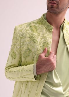 Lime Bandhgala Set with Floral Embroidery Luxury Nehru Jacket With Chikankari Embroidery In Raw Silk, Luxury Intricate Embroidery Off White Nehru Jacket, Designer Bandhgala Suit Men, Luxury Silk Nehru Jacket With Dabka, Luxury Formal Sherwani With Dori Work, Luxury Designer Embellished Nehru Jacket, Luxury Traditional Sherwani With Chikankari Embroidery, Luxury Designer Georgette Sherwani, Luxury Green Nehru Jacket For Formal Occasions