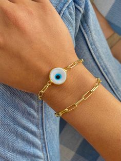 This bracelet set includes two separate bracelets- our signature eye protective bracelet, and large paperclip chain bracelet.  The perfect gift set to where everyday for beauty and good energy. ✨🧿 Made to be adjustable for all styles of wear, with a total length of 8inches for both bracelets. Trendy Gold Evil Eye Bracelet Gift, Trendy Paperclip Chain Bracelet For Gift, Adjustable Paperclip Chain Bracelet As Gift, Trendy Oval Link Paperclip Bracelet, Trendy Evil Eye Jewelry Gift, Trendy Paperclip Bracelet For Gift, Adjustable Paperclip Bracelet As Gift, Handmade Minimalist Evil Eye Bracelet, Trendy Everyday Evil Eye Jewelry