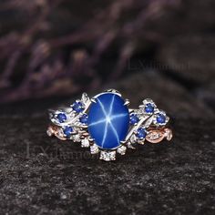 Item description ✦ Handmade, high-quality item! ✦ Material: 925 sterling silver, Solid 10k/14K/18K GOLD (can be made in white/rose/yellow gold) Engagement ring ✦ Center stone: Lab Blue Star Sapphire ✦ Size/Weight: 6x8mm Oval Cut ✦ Side stones: Round Cut Lab Blue Sapphires Wedding band ✦ Gemstones: Round Cut Moissanites Any ring size can be made,if the ring size is not in the option list ,contact me. As it is handmade,it needs 2-4 weeks to finish and then be shipped by usps or DHL. Return policy: We offer 30 days return policy. For any reason, if you are not completely satisfied with your order, you may return it for a refund.  Buyer is responsible for the handcraft fee (15%-30% of the total price) and the return shipping cost. Blue Star-shaped Gemstone Ring, Celestial Blue Sapphire Oval Ring, Celestial Blue Cabochon Ring, Blue Celestial Ring With Center Stone, Blue Celestial 14k Gold Rings, Celestial Blue Oval Ring, Blue Star-shaped Celestial Sapphire Ring, Celestial Style Blue Oval Ring, Celestial Blue Rings With Accent Stones