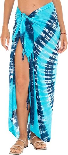 Embrace the art of tropical elegance with SHU-SHI's Women's Sarong Pareo Cover Up, a masterpiece of design and versatility. This stunning sarong is more than just a beach accessory; it's a statement of style, crafted to elevate your seaside ensemble with its unique tie dye patterns and multifunctional charm. Perfect for those who appreciate the blend of traditional craftsmanship and contemporary fashion, this sarong offers comfort, coverage, and countless styling options. Dive into the details b Unique Tie Dye Patterns, Long Pool, Pool Resort, Bathing Suit Women, Unique Tie Dye, Dye Patterns, Chic Skirts, Beach Wrap, Unique Ties