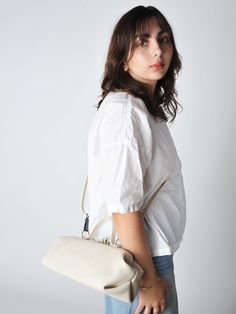 The baguette bag is a charming framed ladies bag. softly structured in a supple leather and lightweight it has a snap top closure and a detachable adjustable strap which allows for multiple carry options.    • handmade in utrecht the netherlands  • 14"l x 6"h x 5"d - unlined  • detachable adjustable shoulder strap 38" - smoke hardware  • 3.5" handles  • single snap top frame closure.  2 small drop down pockets on either side of the bag  • exclusive to roztayger in the us Timeless Everyday Satchel Flap Bag, Everyday Timeless Satchel Flap Bag, On-the-go Satchel Baguette Bag With Adjustable Strap, Timeless Everyday Flap Bag With Double Handle, Timeless Double Handle Flap Bag For Everyday, Timeless Everyday Flap Bag With Adjustable Strap, On-the-go Baguette Satchel Bag With Adjustable Strap, Timeless Everyday Bag With Detachable Handle, Timeless Everyday Top Handle Flap Bag