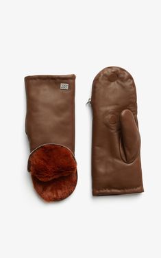 No mitten is as stylish and warm as the BETRICE by SOIA & KYO. This short leather mitten is lined with super-soft faux fur and has a sleek zipper opening at the fingertips – a plush must-have to ward off the winter chill. Short leather mittensLined with faux furSilver metal zipper opening at fingertips with hidden magnet fastening SIZE & FIT Model is 5' 8½" / 174 cm and wears a size XS The second model is 5'8" / 173 cm cm and is wearing a size XS COMPOSITION & CARE INSTRUCTIONS Shell 100% lamb l Cascade Collar, Leather Mittens, Fall Accessories, Winter Accessories, Mitten Gloves, Leather Glove, The Winter, Autumn Winter Fashion, No. 2