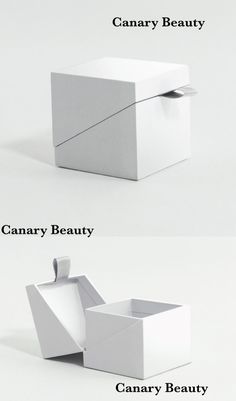 two white boxes sitting side by side, one with an opening and the other without