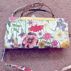 Beautiful, Flowered, Faux Leather. Purse/Clutch. Removable Strap Chain, Gold Tone Metal. Handles Metal. Size 7.5 X 4” Middle Zip, Side Pocket Snap. Black Lining , Card Slots. Gucci Clutch, Oversized Clutch, Envelope Clutch Bag, Pink Clutch, Silk Bag, Faux Leather Purse, Black Wristlet, Vintage Clutch, Clutch Pouch