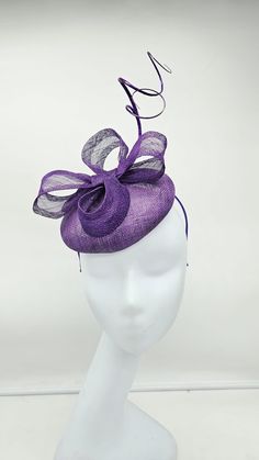 Elegant beautiful purple Fascinator! Classic style to go with a variety of outfits: bridesmaids,  cocktail party,  Kentucky Derby, Rehearsal dinner, Easter and church outfits.  Ones with hair clip and headband. Check our colors.  - Headband and hairclip  - Ready to ship  - Lightweight - Free Shipping - Fast shipping - Customize by adding different color flowers and or feathers Check my store for styles and colors.  Hatsandpearls.etsy.com Find more at my website: Www.hatsandpearls.com  Reach out to me if you can't find what you are looking for.  I can make cake custom orders and help you style and match your outfit  Tag and share your pictures when you wear and style our hats.  Instagram: @hats_pearls Facebook: Hats Pearls Thank you for visiting and happy shopping! Adjustable Purple Top Hat With Curved Brim, Purple Wide Brim Adjustable Costume Hat, Purple Adjustable Wide Brim Costume Hat, Spring Party Costume Hat With Round Crown, Adjustable Headpieces For Kentucky Derby Events, Adjustable Mini Hats For Royal Ascot Party, Summer Party Headpiece With Round Crown, Adjustable Top Hat For Kentucky Derby Party, Adjustable Purple Hat For Kentucky Derby