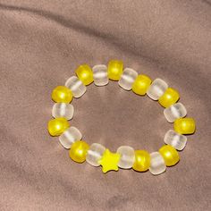 This Bracelet Has Metallic, Yellow And Frosty Clear Pony Beads With A Cute Little Star Separator Yellow Beaded Bracelets For Friendship, Adjustable Yellow Playful Beaded Bracelets, Playful Adjustable Yellow Beaded Bracelets, Yellow Adjustable Beaded Bracelets Playful Style, Yellow Adjustable Beaded Bracelets, Playful Yellow Jewelry With Letter Beads, Cute Yellow Jewelry With Letter Beads, Cute Handmade Yellow Beaded Bracelets, Yellow Stretch Bracelet With Round Beads As Gift