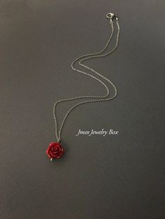 Dark red rose necklace. Red rose is on a delicate but sturdy 18'' stainless steel chain with lobster clasp. If you choose to add initials, please leave the initials in order left to right in the note to sellers box during checkout. *Necklace is available with 1,2 and 3 leaves *15mm Resin rose *Silver plated brass leaves *Stainless steel chain *Handmade with love <3 Like Jmesjewelrybox on Facebook for updates on new jewelry, upcoming sales and giveaways! Plus Facebook fans save 5% :D Find the Red Dainty Jewelry For Mother's Day, Red Flower Charm Jewelry For Valentine's Day, Rose Sterling Silver Jewelry For Valentine's Day, Red Flower Pendant Jewelry For Valentine's Day, Dainty Red Personalized Charm Necklaces, Red Flower Pendant Jewelry For Mother's Day, Dainty Red Flower Pendant Necklace, Red Flower Pendant Necklace For Mother's Day, Rose Nickel Free Jewelry For Gift