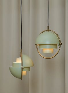 two light fixtures hanging from the ceiling