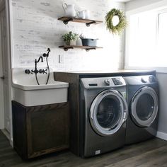 a washer and dryer in a small room