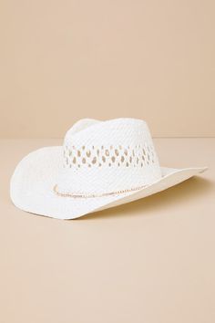 Giddy up and head to the shore with an on-trend look like the Lulus Cutest Cowgirl White Woven Western Hat! Woven straw shapes this cute beach-ready hat that is boasting with coastal western vibes with its curved brim and teardrop-shaped crown with a classic dipped effect and pierced details. An irridescent rhinestone-embellished band lends an eye-catching finish to this must-have accessory. 3. 25" Soft Brim. 22. 25" Interior Circumference With An Internal Drawstring. Crown Measures 4. 25" Tall. White Straw Hat Bands For Ranch, Western Style Fedora Hat In Paper Straw, White Western Straw Hat, Western Style Brimmed Sun Hat In Paper Straw, White Western Hat For Spring, Western Style Short Brim Paper Straw Hat, White Straw Hat Bands For Country Events, Country Style White Straw Hat Bands, Curved Brim Paper Straw Hat For Rodeo