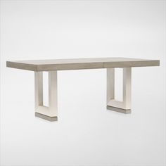 a table that is made out of concrete and has two legs on each end,