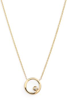 This 14-karat-gold necklace features an open disc pendant glinting with a single bezel-set diamond. 16" length; 2" extender; 1/4" pendant diameter Total diamond weight: 0.01ct. Color: G-H Clarity: SI 14k gold/diamond Imported >Diamond Guide Yellow Gold Solitaire Necklace With Clavicle Chain, Circle Shaped Yellow Gold Necklace With Adjustable Chain, Modern Yellow Gold Round Disc Jewelry, Modern Round Diamond Necklace With Adjustable Chain, Elegant Round Charm Necklace With Cable Chain, Gold Circular Diamond Necklace As Gift, Modern Yellow Gold Diamond Necklace With Round Pendant, Modern Diamond Necklace With Delicate Chain, Gold Open Circle Necklace