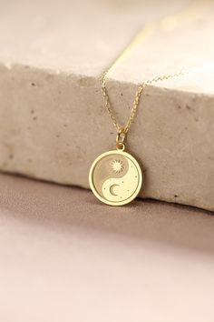 Gold Moon And Sun Pendant - Moon And Sun Gold Necklace ● Material of pendant: Solid Gold 14k ( REAL GOLD ) ● Metal Stamp: 14k ( REAL GOLD ) ● The pendant is available in 5 sizes: - 12,7 mm / 0.5 inches (Diameter) - 14,0 mm / 0,55 inches ( Diameter ) In the photos - 15,3 mm / 0.6 inches ( Diameter ) - 16,5 mm / 0,65 inches ( Diameter ) - 19,1 mm / 0,75 inches ( Diameter ) ( In the photos the size is 14mm / 0.55 inches Diameter ) ( Jump Ring inner diameter: 4 mm ) ● Material of chain: Solid gold 1 Moon And Sun Pendant, Sterling Silver Charm Necklace With Sun And Moon Design, Moon Shaped Celestial Necklace With Sun And Moon Design, Celestial Moon-shaped Necklace With Sun And Moon Design, Celestial Moon Necklace With Sun And Moon Design, Sterling Silver Sun And Moon Round Necklace, Sterling Silver Round Necklace With Sun And Moon Design, Celestial Sun And Moon Round Necklace, Celestial Sun And Moon Round Necklaces