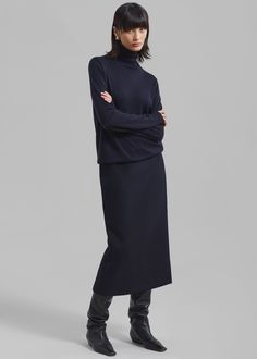 Color: Navy Heavyweight wool blend fabric Regular fit Midi length Back slit Concealed side seam zip closure Lined 50% Wool 50% Polyester Dry Clean By The Frankie Shop. Imported Maxi Skirt Work, Tzniut Fashion, Maxi Skirt Winter, Long Midi Skirt, Simplicity Fashion, The Frankie Shop, Frankie Shop, Navy Skirt, Aline Skirt