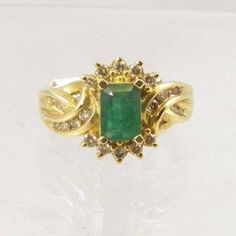 Emerald and Diamond Ring, Emerald Weight 1.03 carats, Diamond Total Weight 0.31 carats, 14k Yellow G Formal Rectangular Emerald Ring With Center Stone, Vintage Emerald Cut Emerald Ring With Halo Setting, 14k Gold Rectangular Emerald Anniversary Ring, Art Deco Rectangular Emerald Ring For Anniversary, Art Deco Rectangular Emerald Anniversary Ring, Vintage Emerald Cut Diamond Emerald Ring, Classic Emerald Ring With Diamond In Rectangular Shape, Classic Rectangular Emerald Ring With Diamond, Antique Style Emerald Cut Emerald Ring With Prong Setting