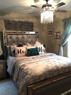 an instagramted photo of a bedroom with a bed and chandelier