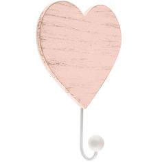 a wooden heart shaped hook with a white ball hanging from it's back end