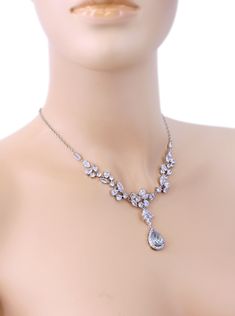 "All my jewelry is nickel free - hypoallergenic. Finish: Platinum Silver or Rose gold plated Material: Top quality rhinestones, AAA Zirconia, lobster clasp, 14K Platinum Silver chain or 14k Rose gold plated chain. (Pic.10) Color of Swarovski Crystal (Pic.5.6): 1) Blue Shade 2) Light Turquoise 3) Golden Shadow 4) Blush Rose 5) Ivory Cream (Pic.1-3) Earrings Length of Earrings: 55mm (from top to bottom) Weight of Earrings: 8g Necklace Length of Necklace: 17 inches We provided two backdrops for you Silver Teardrop Pendant With Elegant Design, Silver Drop Bridal Necklace Gift, Wedding Rhinestone Pendant Necklace With Clavicle Chain, Silver Drop Bridal Necklace As Gift, Wedding Rhinestone Clavicle Chain Necklace, Silver Teardrop Pendant Bridal Necklace, Wedding Necklace With Teardrop Pendant And Jewels, Silver Drop Jewelry For Bridesmaid Gift, Silver Teardrop Pendant Necklace For Bridesmaid Gift