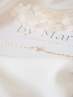 Pink freshwater pearl bracelet, 14k Gold filled cable chain and details. Elegant, great for daily use or for a special occasion.  Perfect as gift for a loved one or a lovely treat for yourself! Comes with a pink velvet pouch. 🌸This bracelet is: - Hypoallergenic - Handmade   - The size of the pearls is of approximately 5 mm. - Bracelet length can be of 14cm, 15 cm, 16cm, 17cm, 18 cm. Please choose your size from the options below. You can use our picture as reference on how to measure your wrist Feminine Pearl Bracelet For Gift, Feminine Pearl Bracelet Gift, Feminine Pearl Bracelet For Gifting, Feminine Pearl Bracelets As Gift, Pink Pearl Drop Bracelet As Gift, Delicate Pearl Chain Bracelet Gift, Delicate Chain Bracelet For Gift, Delicate Pearl Chain Bracelet As Gift, Delicate Pink Pearl Bracelet As A Gift