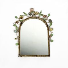 Lovely Mid Century Modern Tole mirror with white expanded metal frame and brass rim. Highly decorative vintage italian Tole mirror from the 1950s. The mid century modern wall mirror is decorated with hand-painted flowers and leaves - a beautiful floral design typical of the 1950s. The mirror glass itself is still in good vintage condition.  Good vintage condition & 100% original condition!  Design & manufacture: Italy, 1950s. Height: 35 cm Width: 26 cm Depth: 2.5 cm This is an original piece and Mirror With Flowers, Vintage Wall Mirror, Floral Mirror, Vintage Mirror Wall, Expanded Metal, Modern Wall Mirror, Modern Mirror Wall, Italian Mid Century Modern, Bamboo Wall