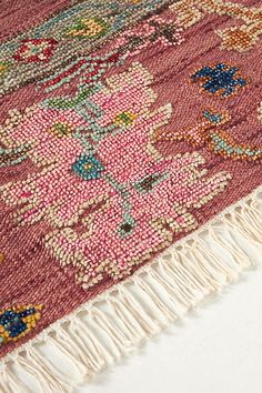 Inspired by traditional ornate floor coverings, this hand-knotted rug features eye-catching designs in cheerful hues. Not sure which rug to choose? Read our guide to find the perfect fit for your space. | Hand-Knotted Perry Rug by Anthropologie in Purple, Size: 5X8, Wool Safavieh Pink Rug, Feizy Jewel Area Rug, Magenta Persian Rug, Faded Colorful Rug, Runner Rug And Area Rug, Eclectic Pink Rug, Runner Next To Rug, Runner Next To Bed Rug, Colorful Persian Rug Bedroom