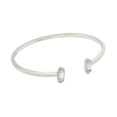 Looking for a pop of sparkle to add to your wrist stack? Meet the Emma Cuff Bracelet, aka your new style essential. Two elongated stones bookend this adjustable metal cuff you can fit to your wrist perfectly. On-trend and oh-so-cute, you'll style this bracelet time and time again. Designer, founder, and philanthropist Kendra Scott started her company in 2002, just three months after her first son was born. Her commitment to innovation, quality, customer service, and detail has taken her from a s Wrist Stack, College Closet, Kendra Scott Silver, Jewelry Kendra Scott, Kendra Scott Bracelet, Statement Cuff Bracelet, Wrist Stacks, Brass Cuff Bracelet, Target Gifts