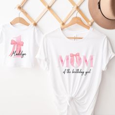 two t - shirts that say mom of the birthday girl and one with a bow on it