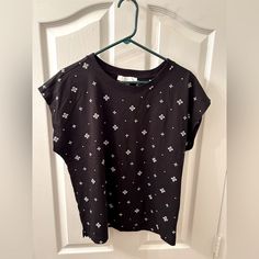 Never Worn Loft Black Dolman Tee With White Stars. Soft Knit, Crew Neck, Relaxed Fit, Hits At Hip. 60% Cotton. 40% Modal. Black Relaxed Fit Knit Top, Black Relaxed Fit Casual Knit Top, Casual Black Cotton Knit Top, Casual Black Knit Top, Black Cotton Knit Top, Black Cotton Knit Top For Spring, Dark Blue Shirt, White Lace Shorts, Pink Cap