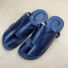 Use code COMBINEDSHIPPING and get $50 off your second pair. View more colors: https://www.etsy.com/shop/sandcruisers/?section_id=25646848 This is a Midnight Navy, not black. For black, click on the link above and see all the colors You will love these traditional Arabian inspired sandals. The straps and soles are made of vegan leather. They are designed to fit your foot loosely with lots of room in the toe-ring and straps. The sole is padded and cushioned so each step is soft against the bottom Leather Non-slip Sandals For Vacation, Non-slip Leather Sandals For Vacation, Outdoor Open Toe Flip Flops, Outdoor Open Toe Slippers With Branded Insole, Summer Sandals With Single Toe Strap For Outdoor, Outdoor Flip Flops With Rubber Sole And Open Toe, Open Toe Slippers For Outdoor, Summer Outdoor Flip Flops With Single Toe Strap, Leather Slide Flip Flops For Outdoor