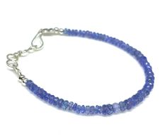 Thank you for coming in! Absolutely beautiful Stone Name:-> Natural Tanzanite, Bracelet Grade: AAA++ Quality Colour:-> Blue  Product Type:-> Faceted Beads. Bracelet Shape:-> Rondelle shape. Size(Dimension-> 4-5 MM Approx. oººooººooººooººooººooººo Loved the collection !! Here is the link to some similar products we have ;) https://rubygemnjewels.etsy.com Shipping Policy FREE STANDARD SHIPPING on all orders above $ 35 and FREE EXPRESS SHIPPING on orders above $ 250. If you want Express Shipping for orders below $ 250. **Estimated Delivery Time** Standard Shipping: 10-15 Days Express Shipping: 3-9 Days <> Returns & exchanges We gladly accept returns and exchanges Contact us within: 14 days after delivery Send back the items within: 30 days of delivery We don't accept cancellations But please Tanzanite Beads, Tanzanite Bracelet, Blue Tanzanite, Bracelet Blue, Bracelet Gemstone, Natural Tanzanite, Beads Bracelet, Stone Names, Faceted Bead