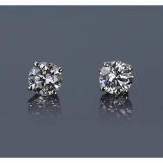 METAL SPECIFICATIONS White Gold 14K STONE SPECIFICATIONS Stone Name : Diamond Stone Cut : Round Stone Details : There is one round cut diamond approx. 0.60 carats (Approx. Diameter 5.2 mm) in each earring. Natural earth mined diamonds. Total : Approx. 1.20 Carats Color : F Clarity : VS1 EARRING SPECIFICATIONS Appraised Value : $4248 .00 Comes with Certificate Round Diamond Earrings, Vs1 Diamond, Diamond Earrings Studs Round, Engagement Ring Photos, Halo Earrings Studs, Round Diamond Engagement Rings, White Gold Diamond Rings, Natural Earth, Diamond Stud