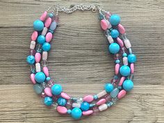 💞One of a kind & ready to ship💞  A fun confetti collection of blues and pink acrylic beads.    This would also be great for a gender reveal party :)  16 inches plus a 4 inch extender chain.   *Smoke and pet free home!* I ship 6 days a week. This particular set is READY TO SHIP!  Thank you for browsing my store! Check out my other items to combine shipping. Blue Jewelry With Colorful Beads For Birthday, Playful Blue Jewelry For Jewelry Making, Blue Beaded Necklace For Birthday With Round Beads, Playful Blue Beaded Necklaces For Gifts, Blue Beaded Necklace For Birthday, Handmade Blue Necklaces For Birthday, Blue Round Beads Necklaces For Birthday, Playful Blue Beaded Necklace For Gift, Blue Round Bead Necklaces For Birthdays