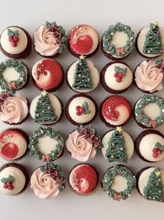 many cupcakes are decorated with christmas decorations