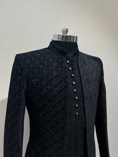 a black jacket on a mannequin dummy