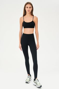 Our famous, form fitting high waist legging redesigned as a stirrup tight. Our ultra luxe Airweight fabric has a supremely soft hand and second skin comfort. BEST FOR: hot yoga, barre, Pilates. Model is 5'10" and wears a size small. Sleek Yoga Activewear With Built-in Bra, High Stretch Leggings With Built-in Bra For Yoga, Sleek Activewear With Built-in Bra And Stretch, Sleek Activewear With Built-in Bra, Gym Leggings With Smoothing Compressive Fit, Compressive Smoothing Leggings For Gym, Seamless Compressive Elastane Leggings, Compressive Smoothing Gym Leggings, Seamless Elastane Leggings For Pilates