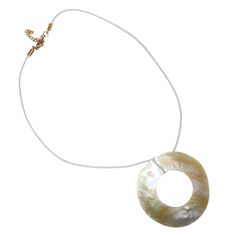 Each piece is a unique work of art, showcasing the iridescent hues and intricate patterns of the sea. Handcrafted with care, this elegant necklace adds a touch of coastal charm to any outfit. Sourced and handmade in Los Angeles. 2" extension on the necklace to adjust length Handmade Iridescent Necklace With Round Pendant, Elegant Abalone Shell Necklace, White Ocean-inspired Necklace In Mother Of Pearl, Elegant Iridescent Adjustable Necklace, Handmade Shell Necklace In Elegant Style, Elegant Iridescent Adjustable Necklaces, Elegant Adjustable Iridescent Necklaces, White Mother Of Pearl Ocean-inspired Necklace, Elegant Adjustable Abalone Shell Necklace