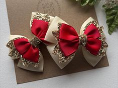 I love these bows !! Such cute ivory , gold, and red Christmas hair bows. The perfect Christmas accessories  to celebrate your little princess' Christmas or to visit Santa. My boutique hair bows are Light weight and attached to a no-slip alligator clips, perfect for girls of all ages.  Hair Bows  Measures Approx. 3.25" x 2.5" . Please reference the size before purchasing to ensure it is the size you would like. I do not accept returns.  Back to Pink hair bow boutiques store :  https://www.etsy.com/shop/PinkHairBowBoutique Christmas Hair Bows Ribbon, Christmas Bows For Hair, Christmas Hair Bows Diy, Gold And Red Christmas, Christmas Cheer Bows, Princess Christmas, Pigtail Hair Bows, Holiday Hair Bows, Stacked Hair Bow