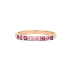 Nine gorgeous semi-precious & precious stones exude flawlessness in this 14K gold ring. The gemstones are set to create a tone-on-tone stream of color that feels subdued, yet vibrant. This is 0.3 Ct and comprised of 14K solid gold. Purple Pink Sapphire Promise Ring, Fine Jewelry Pink Sapphire Ring In Purple, Yellow Gold Rings With Pink Sapphire And Gemstone Accents, Rose Gold Multi-stone Jewelry With Pink Sapphire, Rose Gold Multi-stone Pink Sapphire Jewelry, Pink Amethyst Ring In Fine Jewelry Style, Pink Amethyst Ring Fine Jewelry, Pink Amethyst Gemstone Ring, Fine Jewelry Pink Sapphire Ring With Gemstone Accents