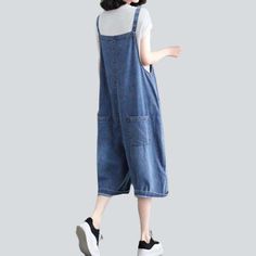 Make a statement this season with our 2023 Summer Collection the knee-length slouchy denim romper. Perfectly combining street style with vintage-inspired details. this must-have romper features suspenders. buttons closure and is crafted from premium denim for ultimate comfort and durability.Distinctive Features: Knee-Length Design: Designed to hit just below the knee. this romper offers a modern. street mode that is perfect for any occasion. Baggy Fit: Its slouchy fit gives it an effortless. com Denim Blue Cotton Jumpsuit For Day Out, Trendy Relaxed Fit Denim Jumpsuit For Day Out, Summer Overalls With Pockets For A Day Out, Spring Shortalls For Day Out, Spring Shortalls Overall For Day Out, Relaxed Fit Overalls For A Day Out, Denim Blue Relaxed Fit Jumpsuit For A Day Out, Casual Denim Jumpsuit For Spring, Casual Denim Blue Jumpsuit For Day Out