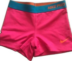 Pink Nike Athletic Shorts For Spring, Spring Nike Pink Athletic Shorts, Nike Pink Athletic Shorts For Spring, Pink Fitted Athletic Shorts For Sports, Sporty Pink Short Bottoms, Sports Pink Bottoms With Short Leg, Nike Pink Short Bottoms, Sporty Short Pink Bottoms, Pink Sports Bottoms With Short Leg