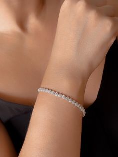 Embrace the thrill with this dainty 14k solid gold baguette stone bracelet! Perfect for any occasion, this tennis bracelet exudes confidence and elegance. A timeless anniversary gift, it features beautiful white gold and sparkling diamond accents. Don't wait until Christmas to treat yourself or a loved one to this stunning piece! Product Details  ✪ Handmade / Handcrafted Fine Jewelry  ✪ Gold Weight: Approx. 7.70 g   ✪ Metal:  14K Solid Gold   ✪Width of each Bangles:   ✪ Length of the each Bangle Dainty Sterling Silver Cubic Zirconia Bracelet For Wedding, Dainty Sterling Silver Wedding Bracelet With Cubic Zirconia, Dainty Diamond Bracelets, Elegant Sparkling Diamond Bracelet For Anniversary, Fine Jewelry Sparkling Bracelet For Anniversary, Elegant Sparkling Bracelets For Anniversary, Sparkling Fine Jewelry Bracelets For Anniversary, Classic Sparkling Diamond Bracelet For Wedding, Dainty Diamond White Bracelet For Wedding