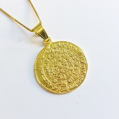 A gold disc of Phaestos charm on a k14 solid gold chain.  The ancient Greek calendar has hieroglyphics on both sides, in the form of a spiral, that have not yet been deciphered by archaeologists. K14 gold is used for the pendant and for the chain for an everlasting value, just like the real one which is made from ceramic. A meaningful gift for a lover of historical artefacts.  The actual disc is displayed in the museum of Herakleion on the Greek island of Crete. The gold necklace is delivered in Ancient Minoan, Phaistos Disc, Greek Jewelry, Gold Disc, Greek Island, Elegant Accessories, Ancient Greek, Meaningful Gifts, Precious Metals