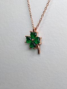 This high quality handmade necklace will bring good luck to you and your loved ones. (It will also present a beatiful display.) Why does a clover represent luck?🍀 One legend has it that the luck factor comes from Eve herself. As Adam and Eve were leaving the Garden of Eden, Eve is said to have plucked a single four-leafed clover as a souvenir of paradise, and this religious connection has led to them being considered lucky ever since. PRODUCT FEATURES; ✰ Weigth: 1.5gr ✰ Height: Optional ✰Color🎨: Rose Gold ✰Pendant Height: 1 cm - 0.39 Inches ✰Material: 925 Silver * This carefully made necklace will be a display of simplicity and elegance on your neck. * All of our products are handmade and their materials are 925 sterling silver. 💎MATERİAL * 925 Sterling Silver -  Rose Gold Plated 🎁IS I Handmade Charm Necklaces With May Birthstone, Handmade Charm Necklace With May Birthstone, Handmade Charm Necklaces For May Birthstone Gifts, Handmade Charm Necklace With May Birthstone For Gift, Handmade May Birthstone Charm Necklace As Gift, Green Flower Pendant Necklace As Gift, Green Flower Pendant Necklace For Gift, Green Clavicle Chain Necklace For Gift, Dainty Green Necklace For Gift